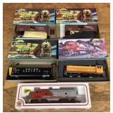 5 boxed HO train cars