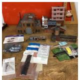 Plastic buildings and assorted layout kits