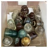 Tote of glass and ceramic insulators