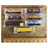 7 N gauge railroad cars