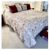 King Beautyrest bed with faux brass headboard