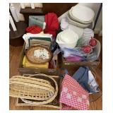 2 boxes w/table linens, baskets, plastic ware