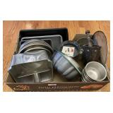 Box of bakeware, flour sifter, pans, etc.