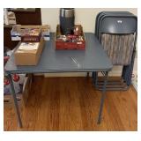 4 folding chairs with padded seats & card table