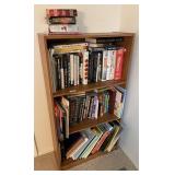 Pressed wood bookcase and contents