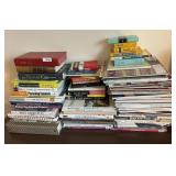 3 stacks of books --sewing, travel, computer,