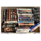 Box of VHS movies --James Bond and Disney