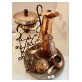 Copper serving pieces and easels