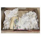 Flat of fancywork, hand crocheted doilies, etc.