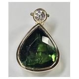 14k gold pendant with green stone