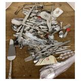 Assorted flatware and serving pieces