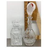 2 clear glass decanters