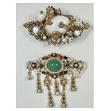 Hobï¿½ gemstone and Original by Robert brooches