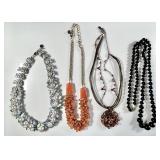 4 costume jewelry necklaces