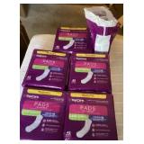 6 packages of feminine pads