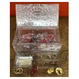 Costume jewelry in plastic jewelry box
