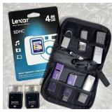 6 thumb drives, 2 SD card readers, NEW 4GB card