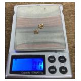 Two14k gold earring backs