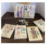 Collection of sewing patterns and thimbles