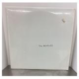 The Beatles LP in shrink with poster