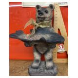 Bear and fish statue