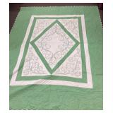 Green embroidered quilt 96 x 78"