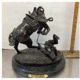 "Falling Rider" sculpture by C.M. Russell