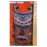 Carved wooden mask