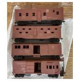 4 HO scale box cars