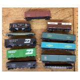 11 HO scale model train cars