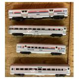 4 HO scale passenger cars