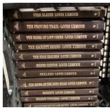 11 volumes of Louis Lï¿½Amour leather bound books