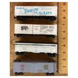 4 HO scale boxcars