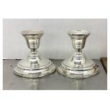 Pair of weighted sterling candle holders