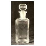 Antique clear glass Rieger apothecary jar
