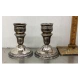 Pair of weighted sterling candle holders