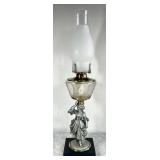 Antique figural oil lamp --heavy metal figure