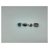 Four sterling silver rings