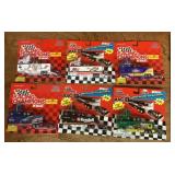 6 Racing Champions packaged racing trucks