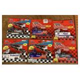 6 Racing Champions packaged racing trucks