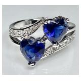 Sterling silver ring with heart-shaped blue