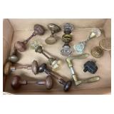 Box of vintage metal and glass door knobs
