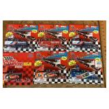 6 Racing Champions packaged racing trucks