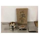 tea strainer, belt buckles, Native American plaque