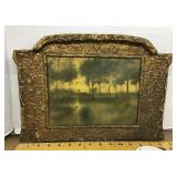 'Home of the Heron' in gilt gesso on plywood frame