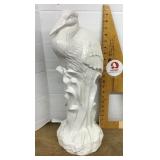 White ceramic crane figure