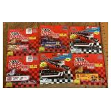 6 Racing Champions packaged racing trucks
