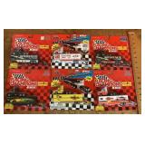 6 Racing Champions packaged racing trucks