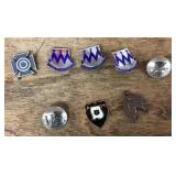 Pins, insignia, and charms