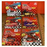 6 packaged racing trucks